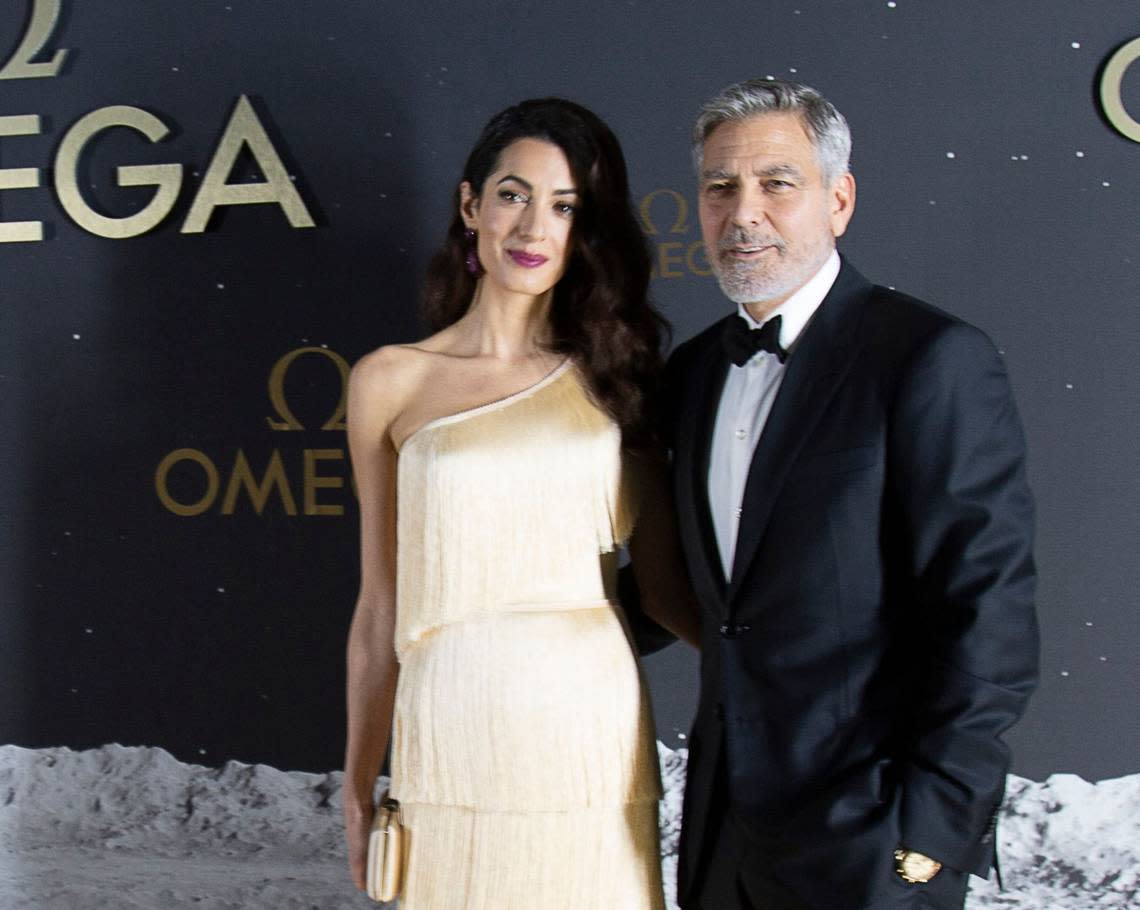 Kentucky native George Clooney, pictured here with his wife Amal, is promoting a new movie he’s directed called “The Boys in the Boat.” Emre Kelly/USA TODAY NETWORK