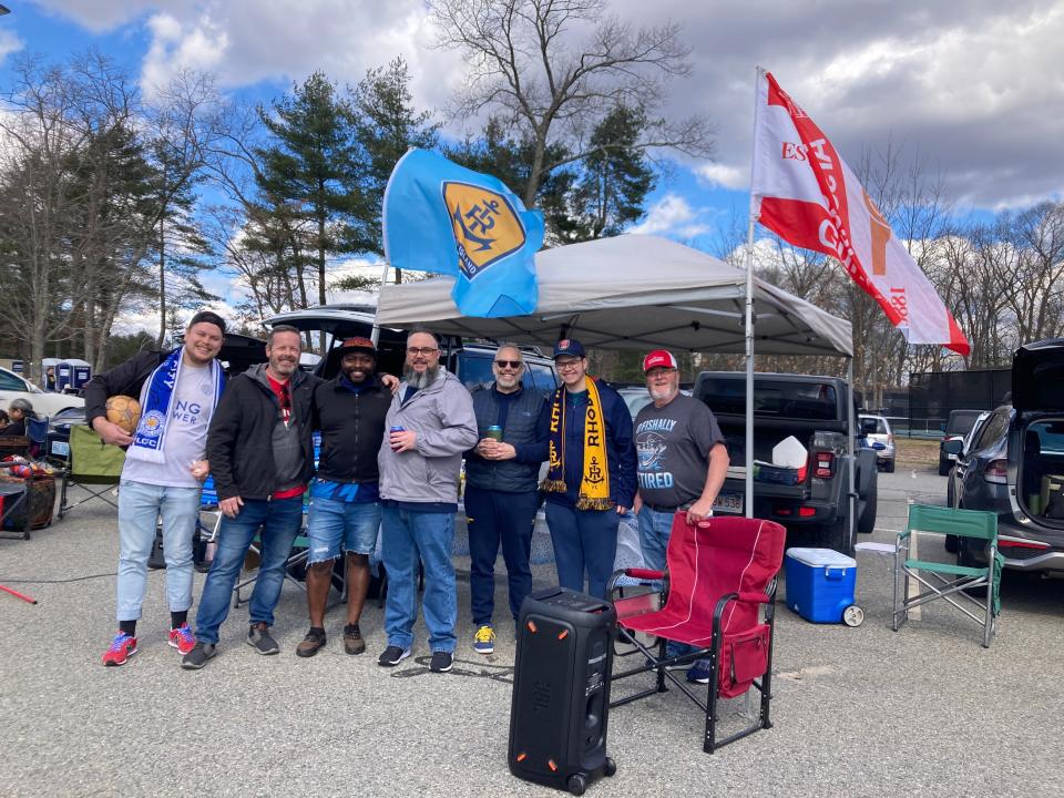 Members of the Rhode Island Gooners, a group that gathers to watch Arsenal games at Hope Street Pizza in Providence, were among the soccer fans tailgating at Saturday's season opener.