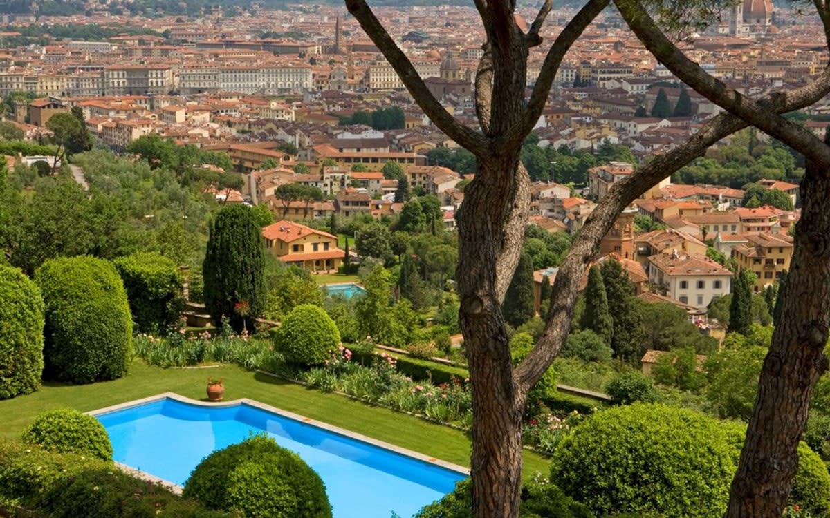 Torre di Bellosguardo stands in magnificent grounds, with a pool that looks over all of Florence