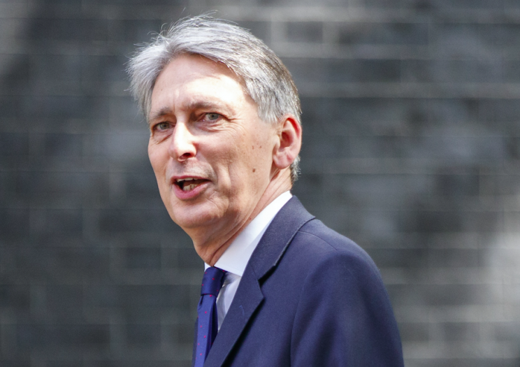 Philip Hammond appears to have backtracked on the issue of tax after Brexit (Picture: Rex)