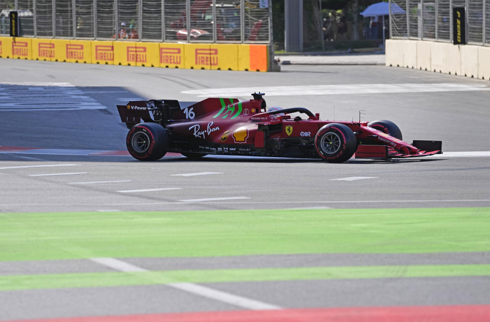 Ferrari driver Charles Leclerc of Monaco steers his car during the qualifying session at the Baku Formula One city circuit in Baku, Azerbaijan, Saturday, June 5, 2021. The Azerbaijan Formula One Grand Prix will take place on Sunday. (AP Photo/Darko Vojinovic)