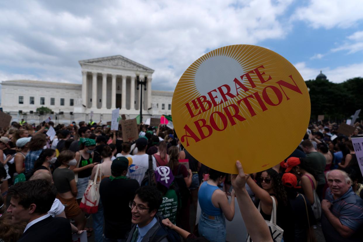 Abortion rights activists protest outside the Supreme Court in Washington, Friday, June 24, 2022. 