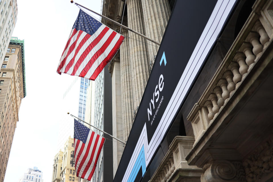 NEW YORK, NEW YORK - APRIL 12: American flags are seen waving on the New York Stock Exchange on April 12, 2022 in New York City. Data released this morning showed that inflation rose 8.5 percent in March, the highest annual increase since December 1981, amid energy prices soaring due to Russia&#39;s war in Ukraine. (Photo by Michael M. Santiago/Getty Images)