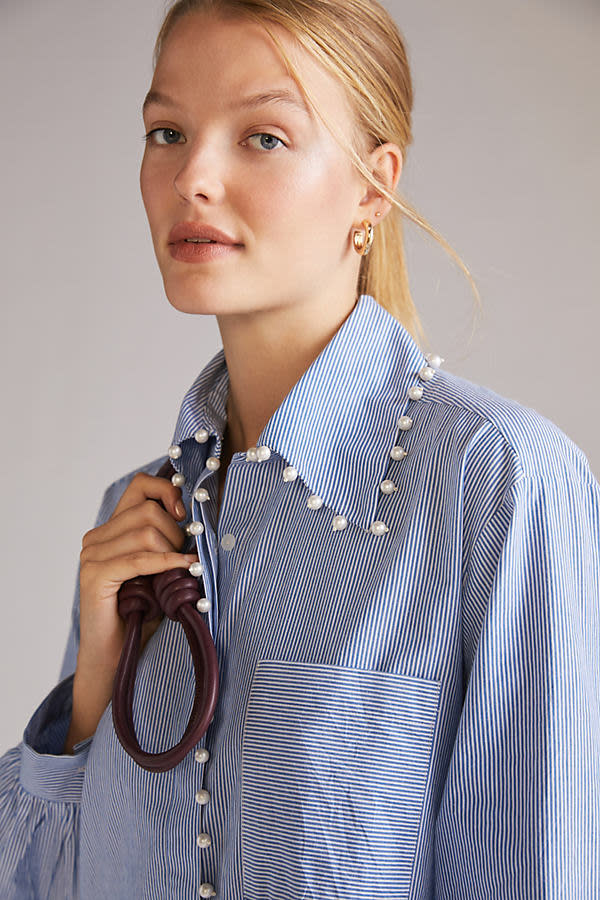 <p><a href="https://go.redirectingat.com?id=74968X1596630&url=https%3A%2F%2Fwww.anthropologie.com%2Fshop%2Fmememe-embellished-buttondown-tunic&sref=https%3A%2F%2Fwww.townandcountrymag.com%2Fstyle%2Ffashion-trends%2Fg44319781%2Fand-just-like-that-season-2-outfits%2F" rel="nofollow noopener" target="_blank" data-ylk="slk:Shop Now;elm:context_link;itc:0;sec:content-canvas" class="link rapid-noclick-resp">Shop Now</a></p><p>Embellished Buttondown Tunic</p><p>$148.00</p><p>anthropologie.com</p>