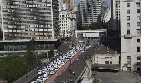 Taxis are seen parked on the street during a protest against online car-sharing service Uber, in front of the city hall of Sao Paulo, Brazil, October 8, 2015. REUTERS/Nacho Doce