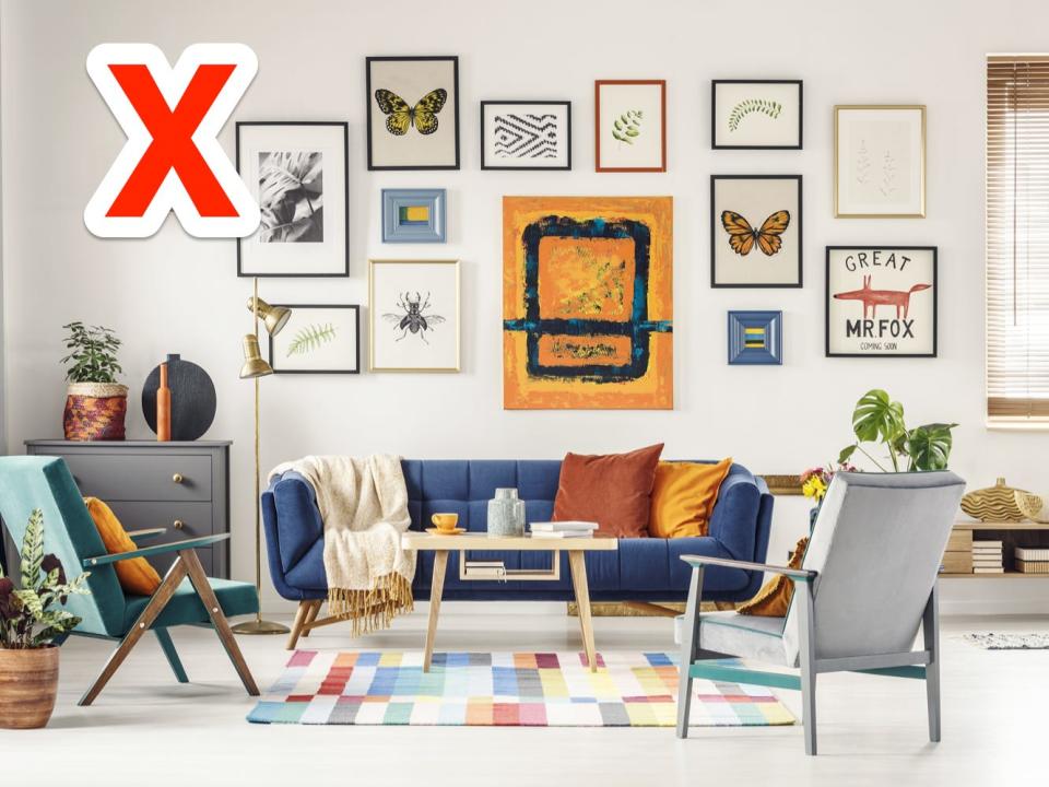 red x over a big gallery wall in a maximalist living room
