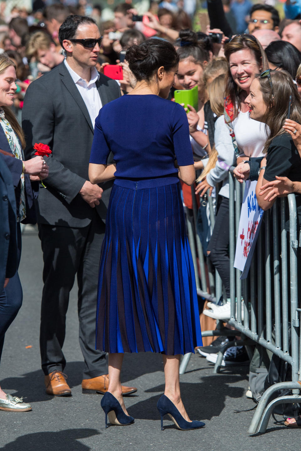 Meghan’s Givency bespoke navy pleated skirt could be made of a slightly see-through fabric as these pictures have revealed. Photo: Getty