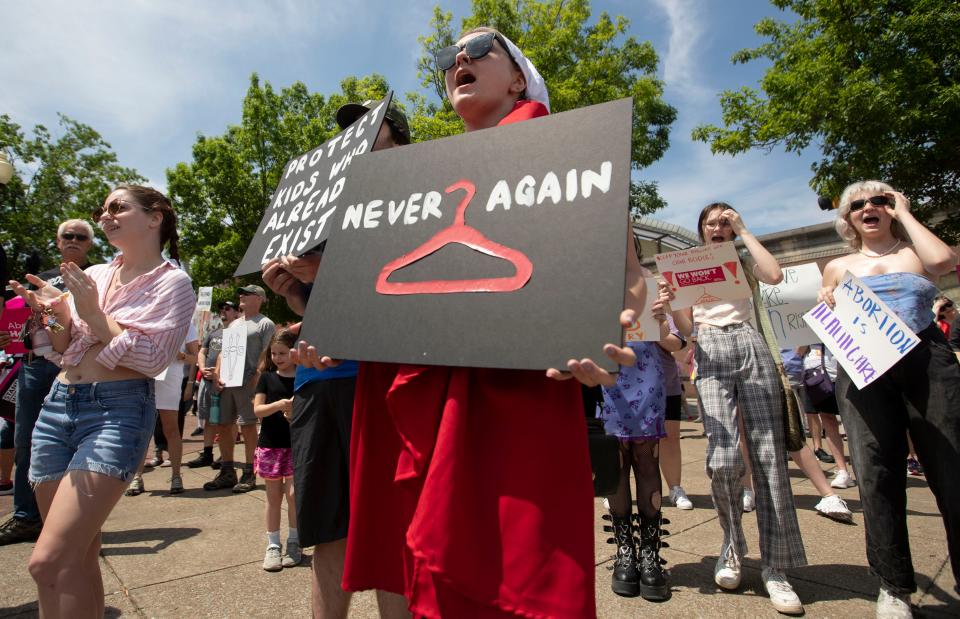 Brooke Buckley chants with abortion rights activists during the Bans Off Our Bodies Memphis rally with Planned Parenthood of Tennessee and North Mississippi on Saturday, May 14, near Beale Street in Memphis, Tenn. Abortion rights activists rallied in opposition of the leaked draft Supreme Court majority opinion showing a majority of judges would rule in favor of overturning Roe v. Wade. 