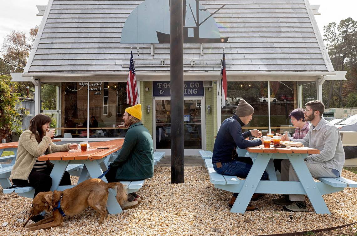 Customers dine outside at Saltbox Seafood Joint on Wednesday, Nov. 16, 2022, in Durham, N.C.