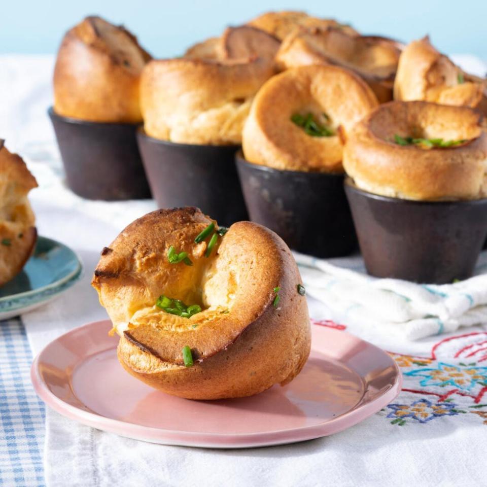 popovers on pink plate and in pan