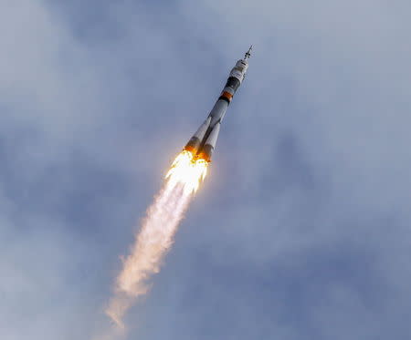 The Soyuz TMA-18M spacecraft carrying the crew of Aidyn Aimbetov of Kazakhstan, Sergei Volkov of Russia and Andreas Mogensen of Denmark blasts off from the launch pad at the Baikonur cosmodrome, Kazakhstan, September 2, 2015. REUTERS/Shamil Zhumatov