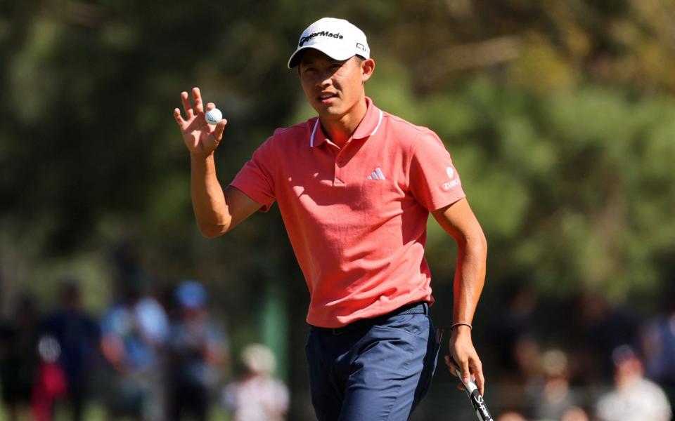 Collin Morikawa celebrates a birdie on eight