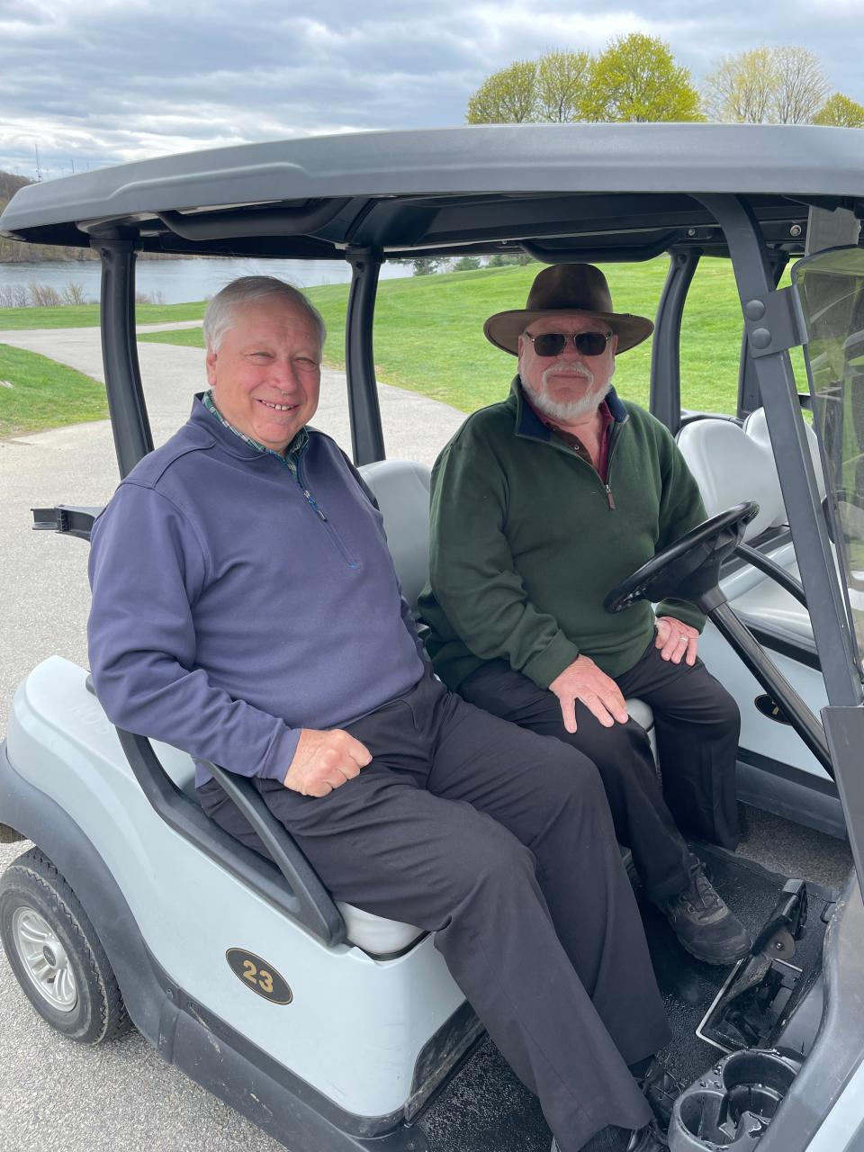 From left, Tom Mullins and Paul Cummings have organized golf trips in New England and down south for three decades.