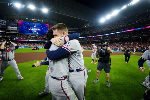 Freddie Freeman and Dansby Swanson hug to celebrate the Atlanta Braves' World Series victory. (Photo: Daniel Shirey via Getty Images)