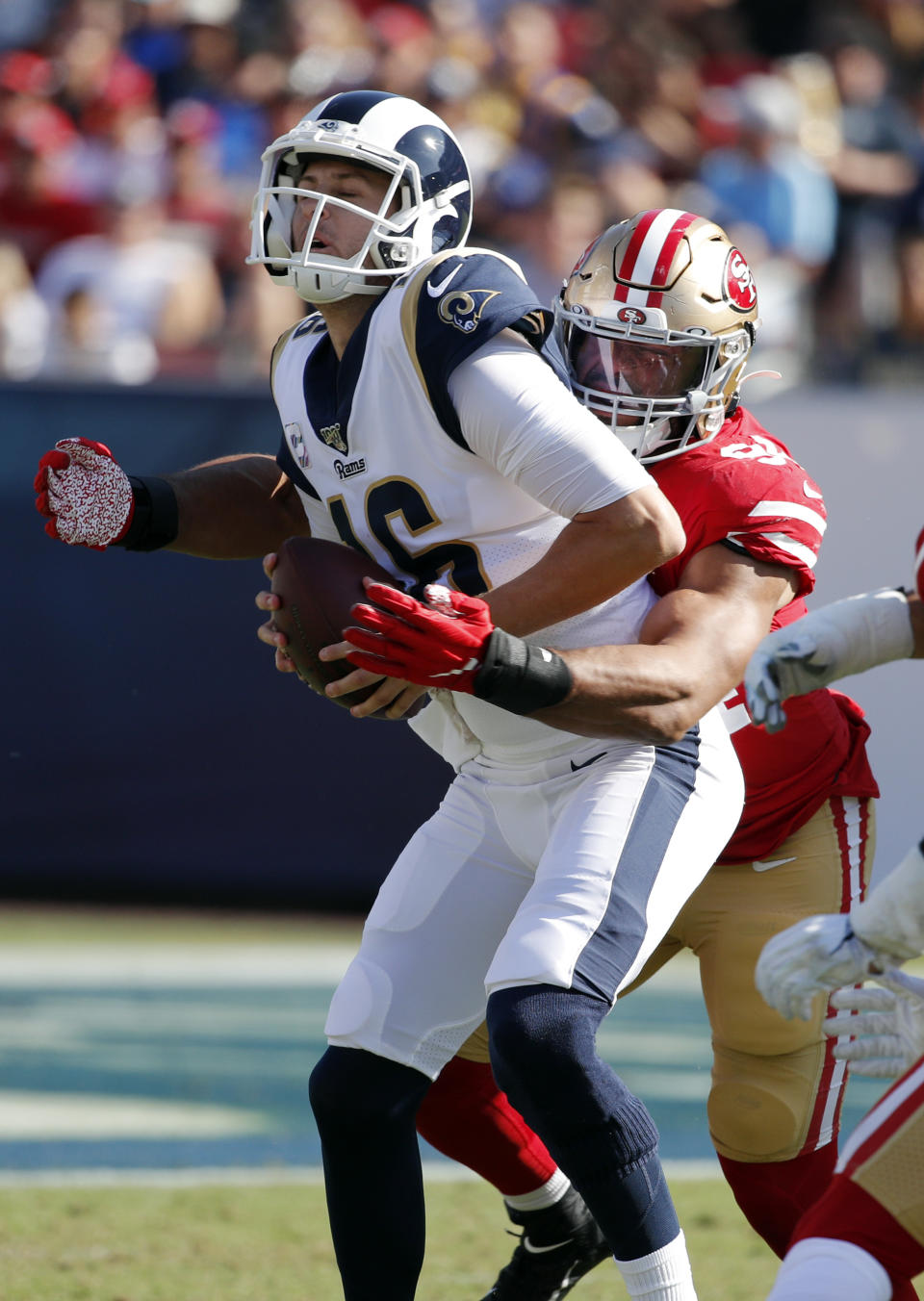 Los Angeles Rams quarterback Jared Goff (16) is sacked by San Francisco 49ers defensive end Solomon Thomas during the second half of an NFL football game Sunday, Oct. 13, 2019, in Los Angeles. (AP Photo/John Locher)