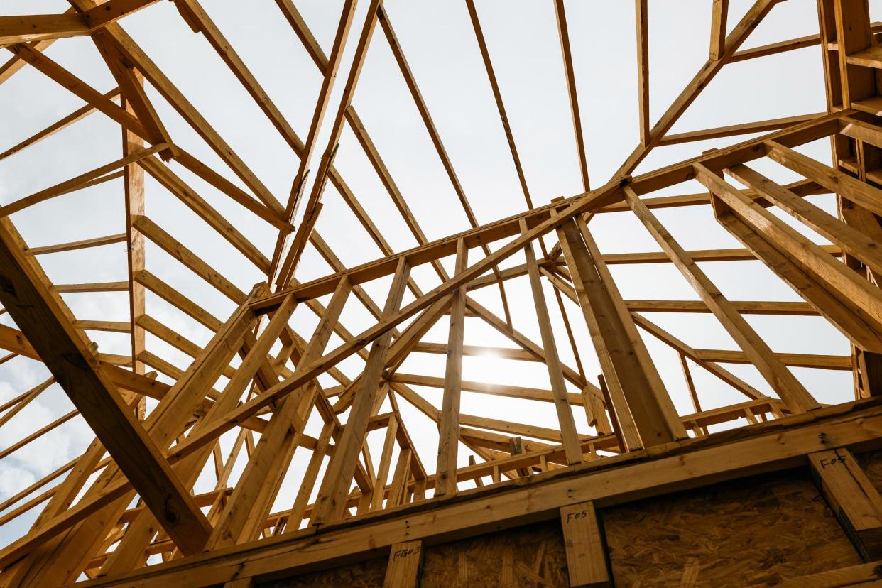 <span>A house under construction in Texas on 18 March 2024.</span><span>Photograph: Jordan Vonderhaar/Bloomberg via Getty Images</span>