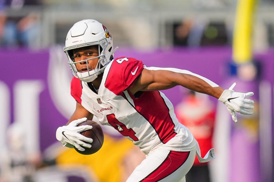 Oct 30, 2022; Minneapolis, Minnesota, USA; Arizona Cardinals wide receiver Rondale Moore (4) runs with the ball against the Minnesota Vikings in the second quarter at U.S. Bank Stadium.