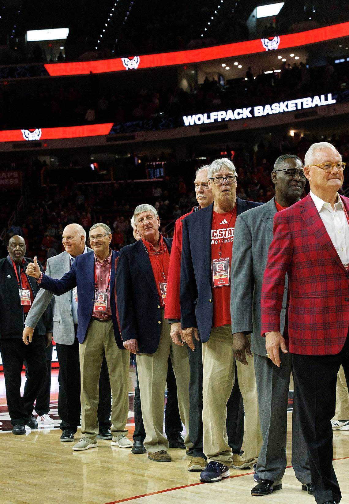 Members of the N.C. State men’s basketball 1974 national championship team are honored during a halftime ceremony on Saturday, Feb. 24, 2024, at PNC Arena in Raleigh, N.C.