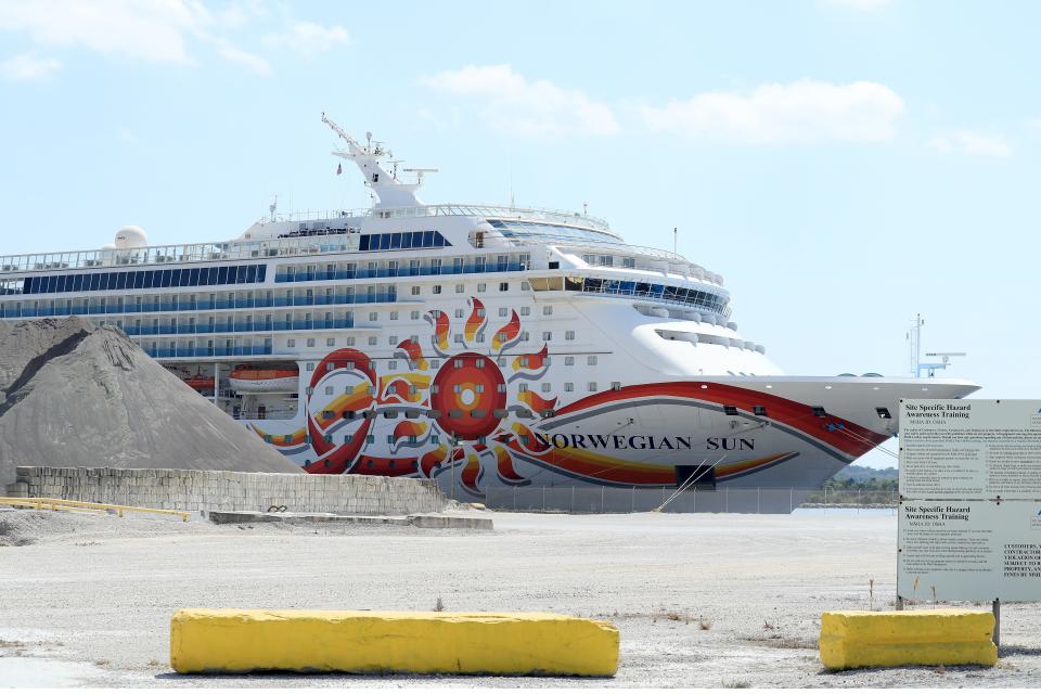 Norwegian Cruise Line Holdings Ltd. is suing Florida’s surgeon general over the state’s law banning vaccine passports. Here, the company's Norwegian Sun sits docked at the Port of Jacksonville on March 27, 2020.