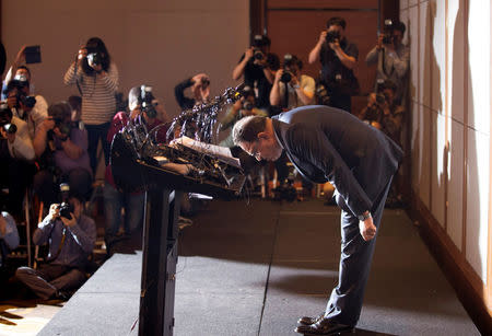 Ata Safdar, Head of Reckitt Benckiser Korea and Japan, bows his head during a news conference to apologize over deadly lung injuries linked to the use of the humidifier sterilizers, some marketed by the firm, in Seoul, South Korea, May 2, 2016. Yonhap/Yun Dong-Jin/via Reuters