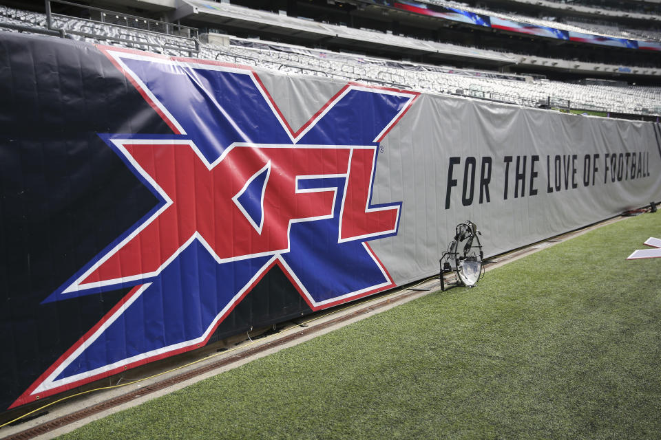 A general view of the XFL logo on a sideline banner before an XFL football game between the Tampa Bay Vipers and the New York Guardians, Sunday, Feb. 9, 2020, in East Rutherford, N.J. (AP Photo/Steve Luciano)