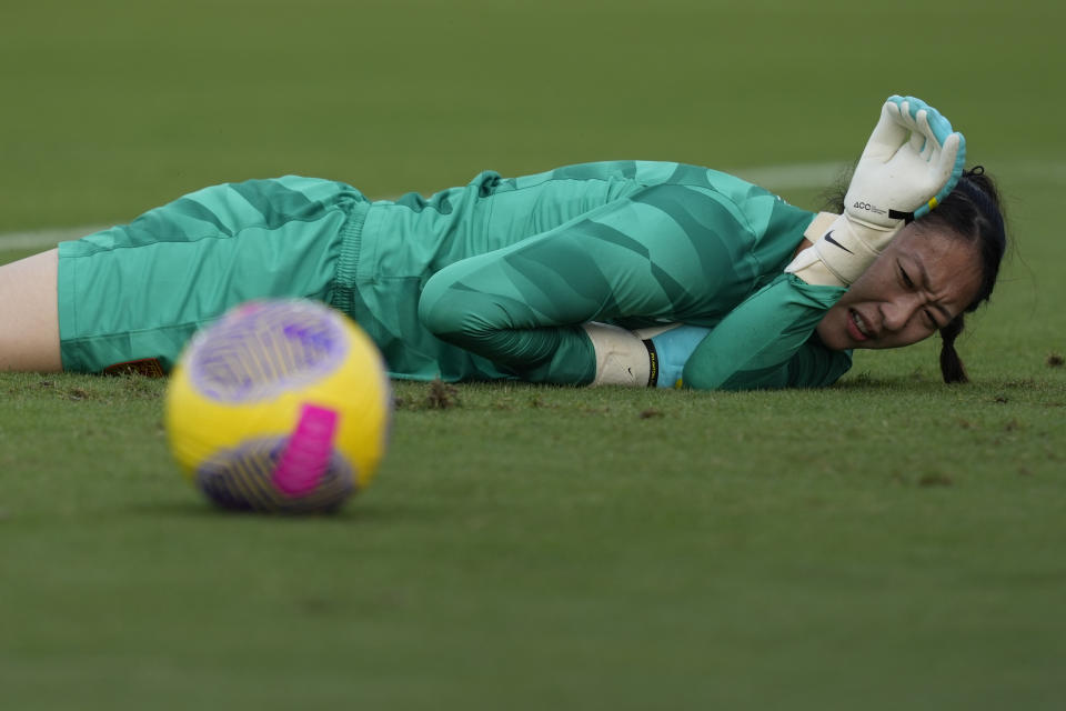 China goalkeeper Xu Huan lies on the pitch after a goal by United States forward Sophia Smith during the first half of a women's International friendly soccer match in Fort Lauderdale, Fla., Saturday, Dec. 2, 2023. (AP Photo/Rebecca Blackwell)