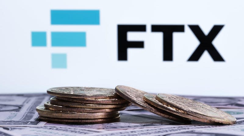 Stock photo of FTX logo and money