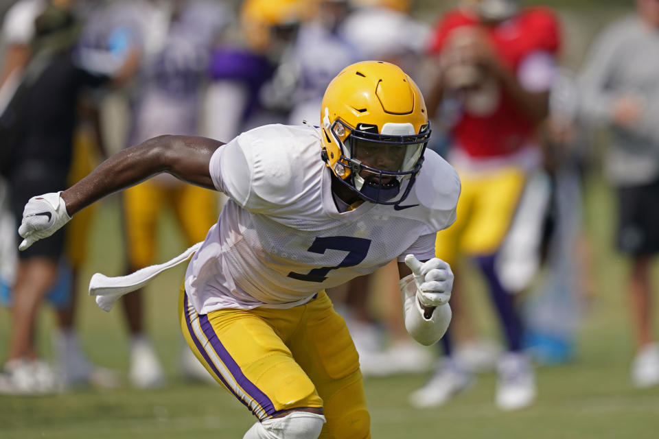 FILE - LSU wide receiver Kayshon Boutte (7) runs through drills during their NCAA college football practice in Baton Rouge, La., Wednesday, Aug. 17, 2022. Boutte was selected to The Associated Press preseason All-America team Monday, Aug. 22, 2022. (AP Photo/Gerald Herbert, File)