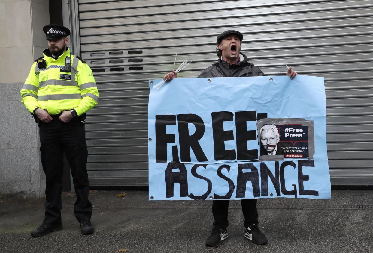 U.S. authorities accuse Assange of scheming with former Army intelligence analyst Chelsea Manning to break a password for a classified government computer.