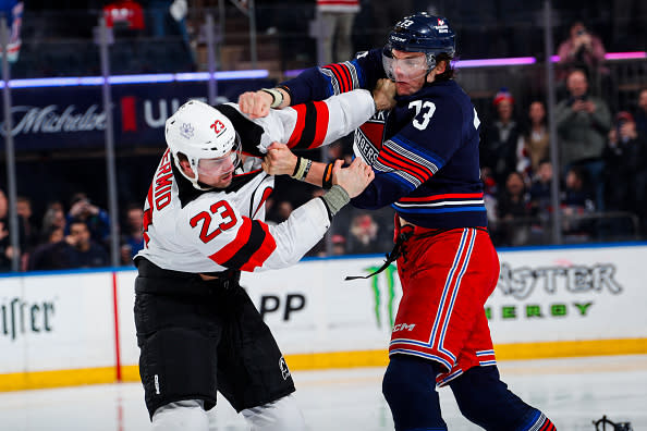 NEW YORK, NEW YORK – APRIL 03: Matt Rempe #73 of the New York Rangers fights Kurtis MacDermid #23 of the New Jersey Devils at Madison Square Garden on April 3, 2024 in New York City. (Photo by Jared Silber/NHLI via Getty Images)