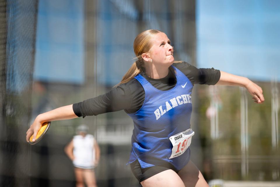 Blanchet Catholic’s Molly Mucken wins the 2A discus during day one of the OSAA State Track and Field Championships at Hayward Field in Eugene, Ore.