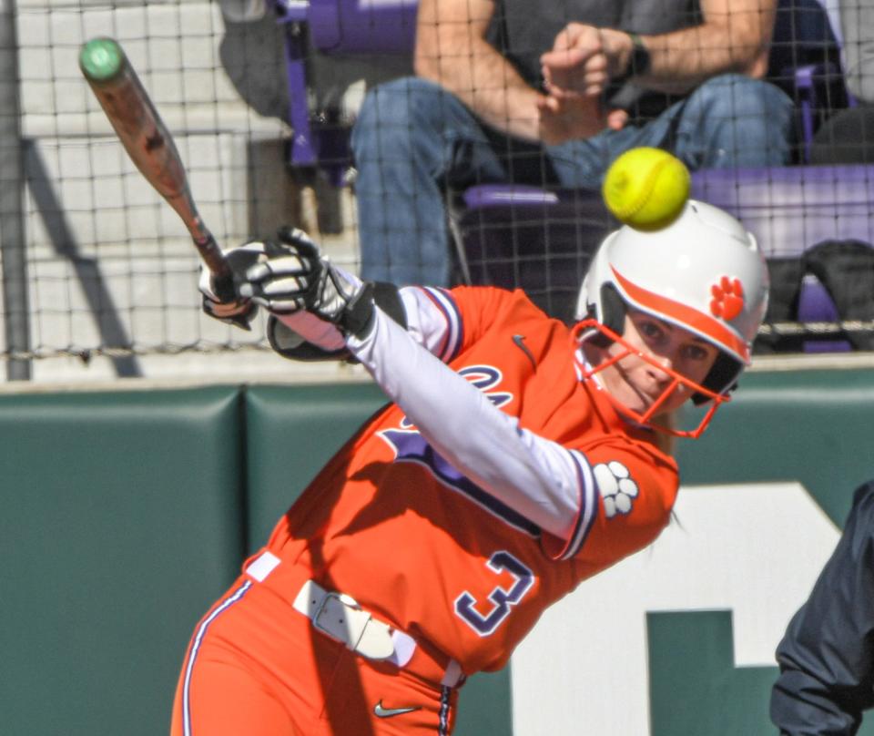 Clemson's am Russ hits a ball during a team scrimmage in preseason.