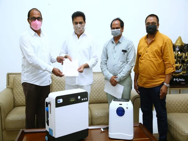 TIF donating oxygen concentrators to Minister of Municipal Administration and Urban Development K T Rama Rao (Photo/ANI)