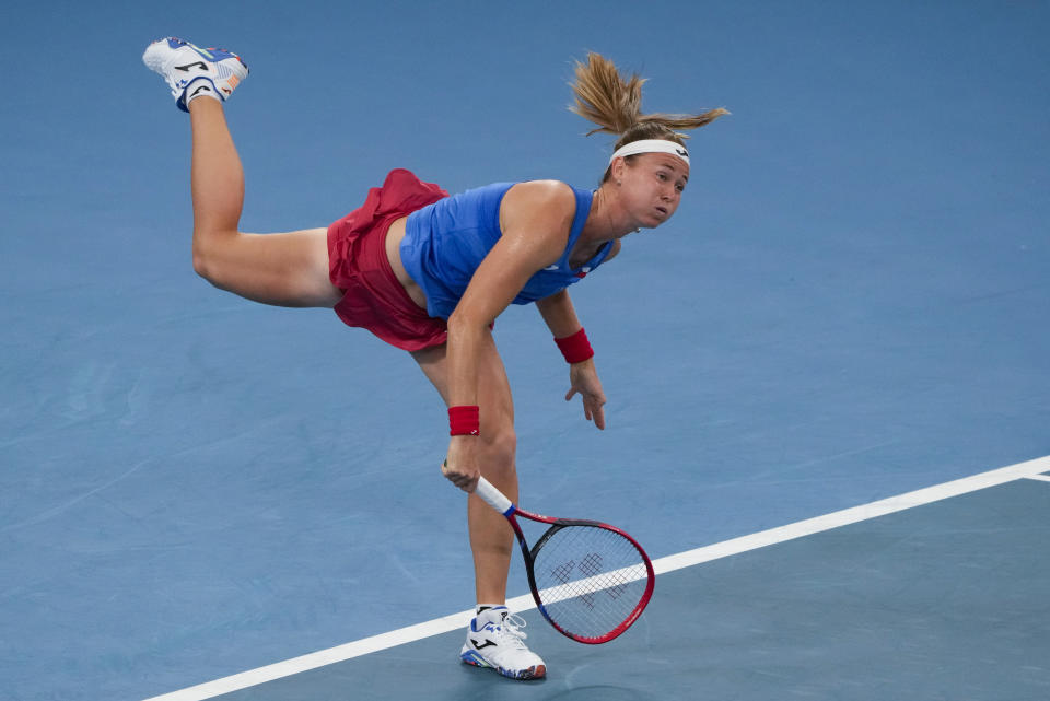 Marie Bouzkova of the Czech Republic serves to United States' Madison Keys during their Group C match at the United Cup tennis event in Sydney, Australia, Thursday, Dec. 29, 2022. (AP Photo/Mark Baker)