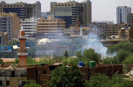 Tear gas fired to disperse Sudanese demonstrators is seen during a protest demanding Sudanese President Omar Al-Bashir to step down in Khartoum, Sudan April 6, 2019. REUTERS/Stringer