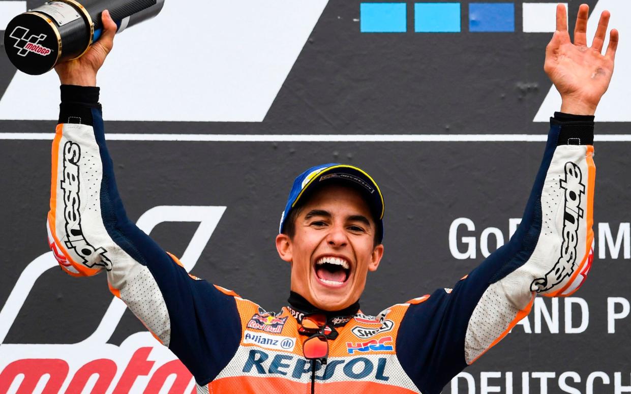 Marc Marquez, who leads the championship, is seen here celebrating at Sachsenring - AFP
