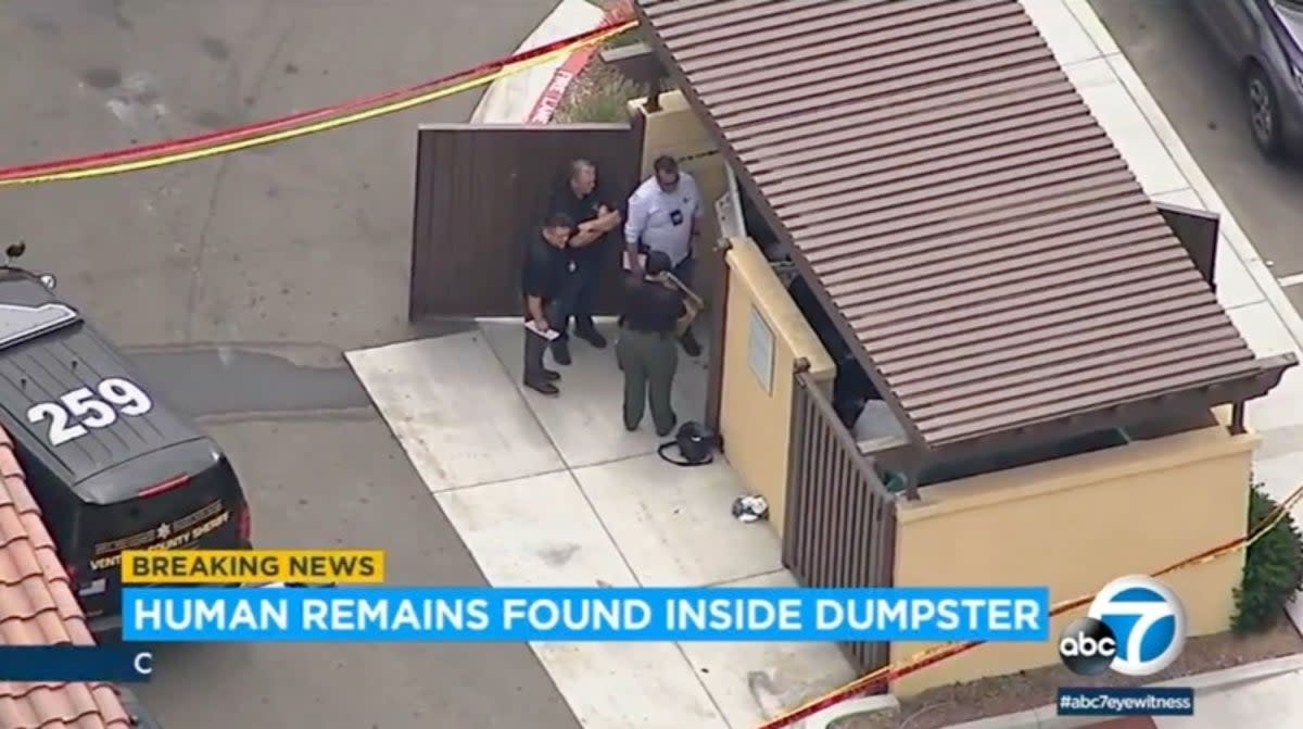 Officers on the scene after human remains were found inside a dumpster (Eyewitness News)