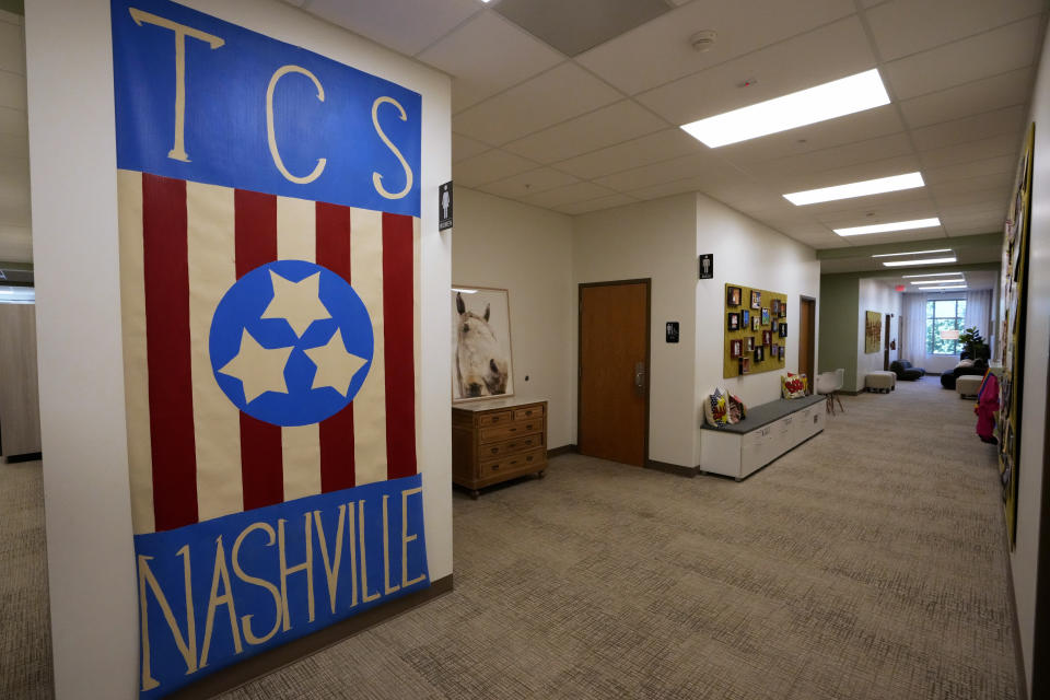 A large painting decorates a remodeled hallway in The Covenant School Tuesday, June 25, 2024, in Nashville, Tenn. The school reopened in April 2024, a little over a year after three students and three adults were killed in a shooting at the school. (AP Photo/Mark Humphrey)