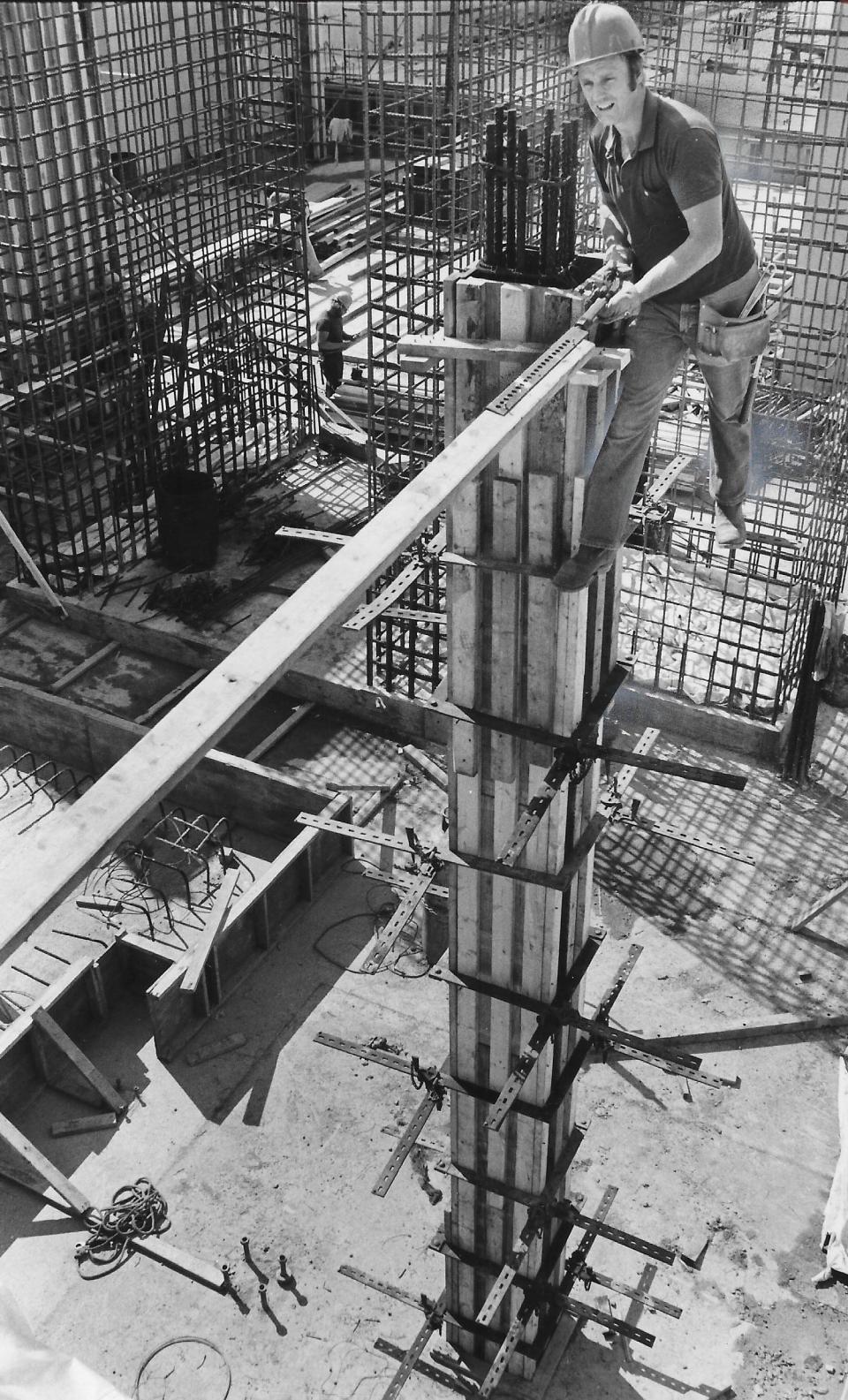 Orm Newcomb, an employee of the John G. Ruhlin Construction Co., works high above ground Sept. 26, 1977, while bracing a column for the Recycle Energy System plant on Opportunity Parkway in Akron.