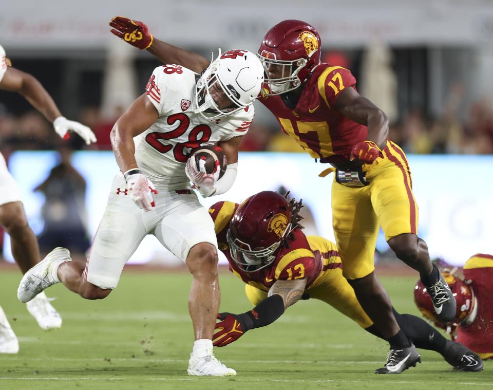 Utah Utes safety Sione Vaki (28) runs at the Los Angeles Memorial Coliseum on Saturday, Oct. 21, 2023.