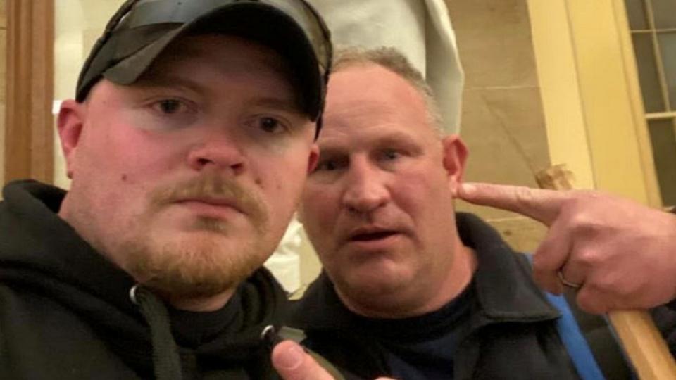 Rocky Mount Police Officer Jacob Fracker (left) and Sergeant Thomas Robertson are shown in the photo they shot of themselves inside the U.S. Capitol on Jan. 6. (U.S. Attorney’s Office for the District of Columbia)