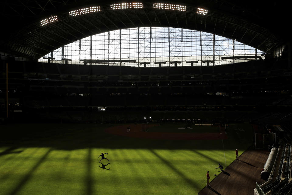 Los Angeles Dodgers' Clayton Kershaw warms up before Game 7 of the National League Championship Series baseball game against the Milwaukee Brewers Saturday, Oct. 20, 2018, in Milwaukee. (AP Photo/Charlie Riedel)