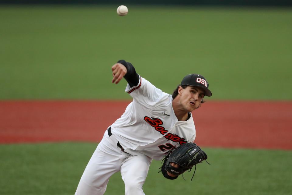 Oregon State's Jake Pfennigs pitches to Auburn during the second inning of an NCAA college baseball tournament super regional game Saturday, June 11, 2022, in Corvallis, Ore. (AP Photo/Amanda Loman)