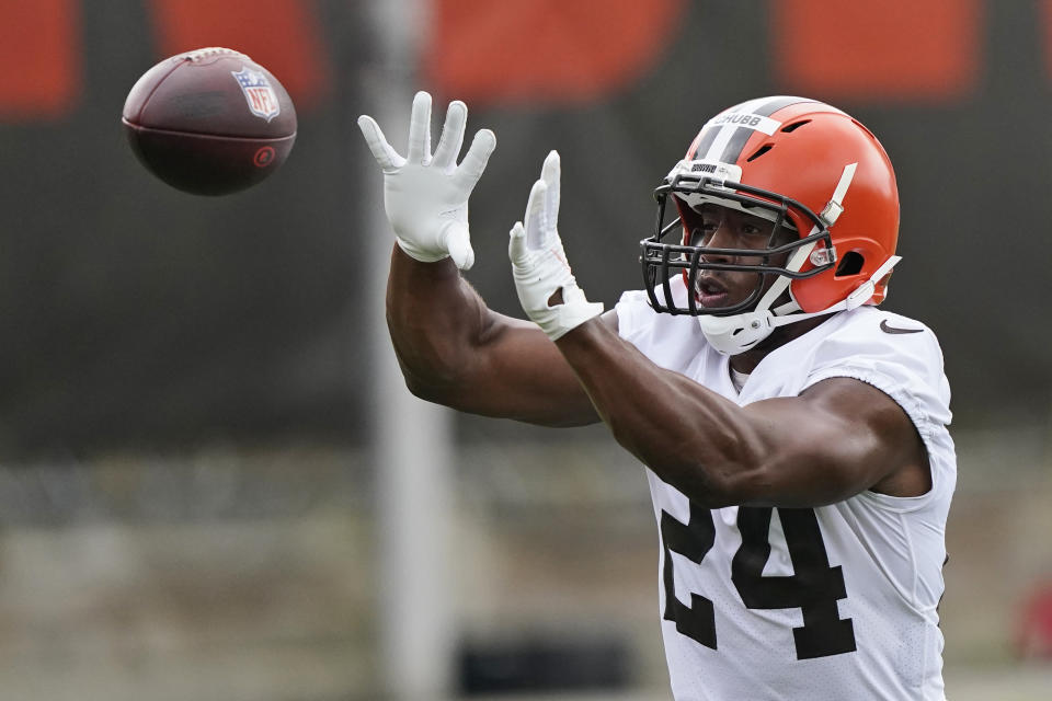 Cleveland Browns running back Nick Chubb catches a pass during an NFL football practice, Thursday, July 29, 2021, in Berea, Ohio. (AP Photo/Tony Dejak)