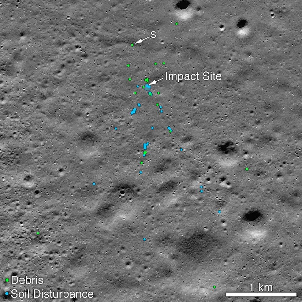 lunar surface with blue and green dots indicating Vikram lander debris spread over several kilometers