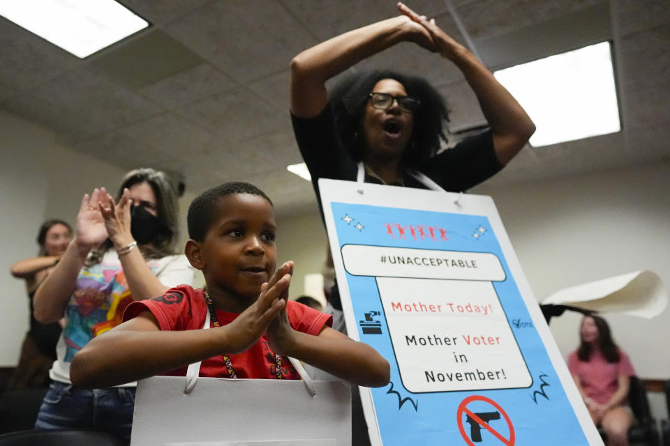 Parents and children speak in a meeting at the state Capitol, where children spoke to legislators about gun violence, Thursday, Sept. 19, 2024, in Atlanta. (AP Photo/Mike Stewart)