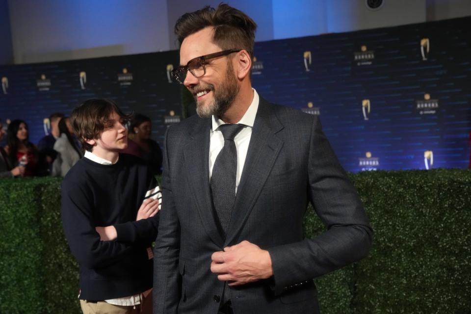 Actor Joel McHale walks the red carpet before the NFL Honors awards special at the Phoenix Convention Center on Thursday, Feb. 9, 2023.