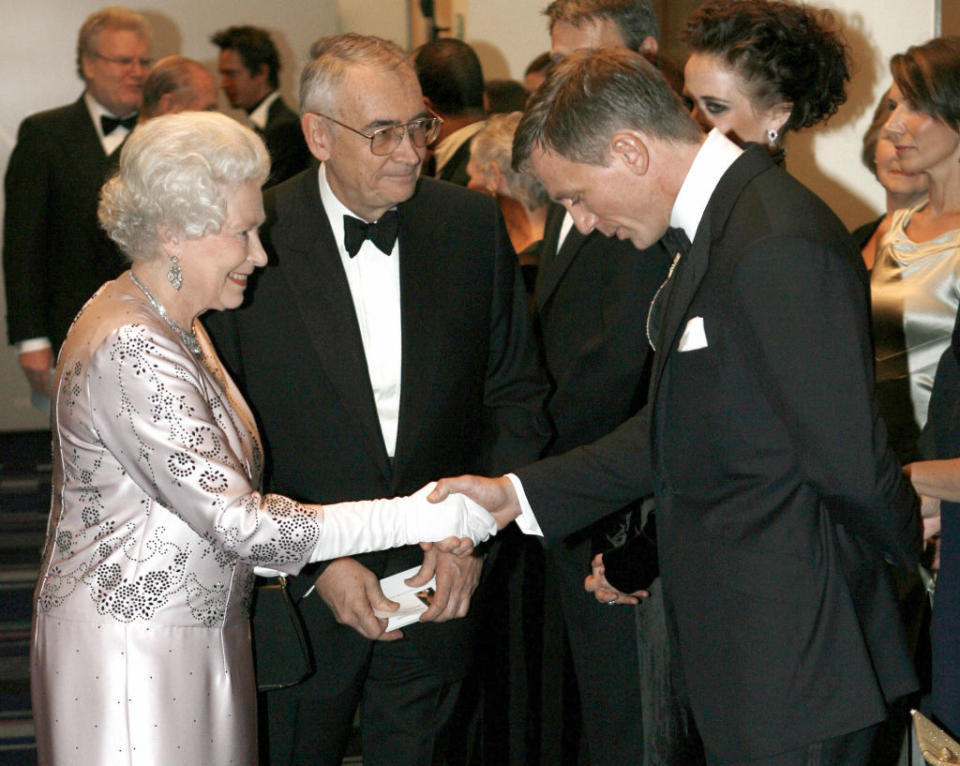 Queen Elizabeth greets Daniel Craig at the world premiere of 