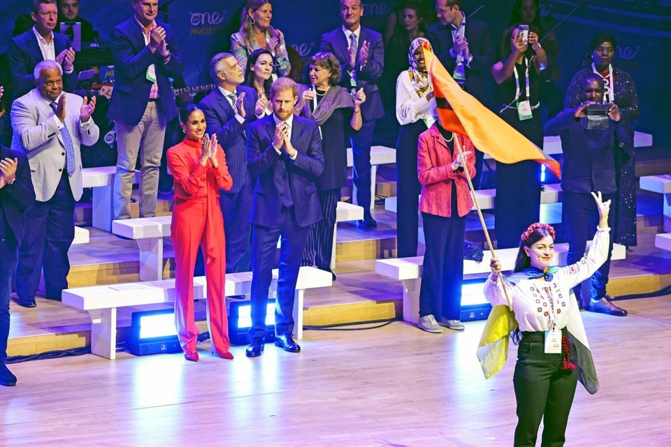 MANCHESTER, ENGLAND - SEPTEMBER 05: Meghan, Duchess of Sussex and Prince Harry, Duke of Sussex watch a performance during the Opening Ceremony of the One Young World Summit 2022 at The Bridgewater Hall on September 05, 2022 in Manchester, England. The annual One Young World Summit brings together more than two thousand of the brightest young leaders from every country and sector, working to accelerate social impact both in-person and digitally. Meghan is a counsellor for the organisation, alongside Justin Trudeau, Sir Richard Branson, and Jamie Oliver, among others. (Photo by Chris Jackson/Getty Images)