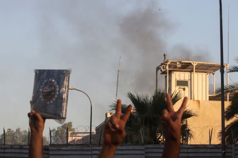 Protesters gather near the Swedish embassy in Baghdad